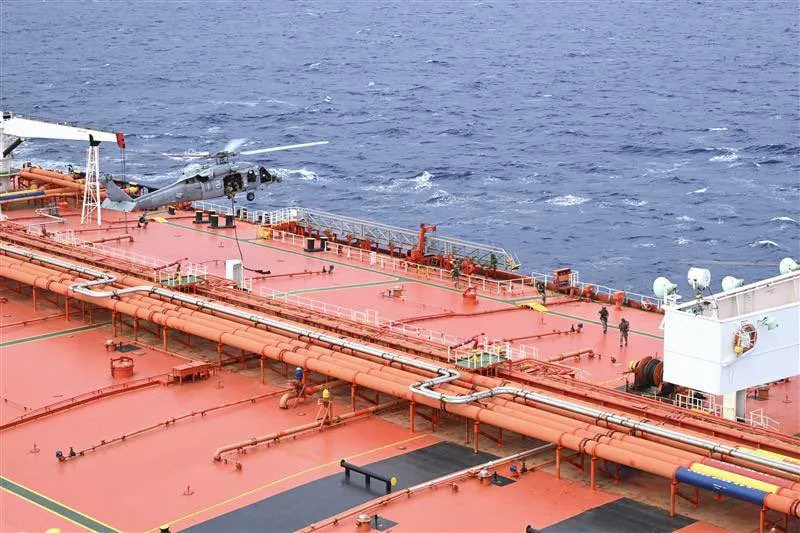 Iran-Linked Oil Tankers Sail West After Boarding by US photo