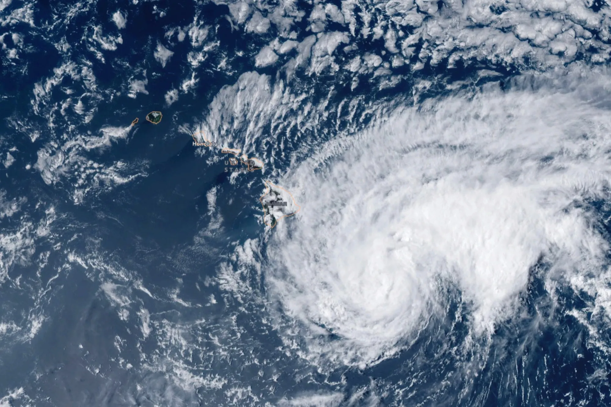 Hawaii Faces Rare Hurricane Strike Threatening Flooding Rain photo