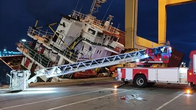 Cargo Ship Lists Against Pier in Genoa