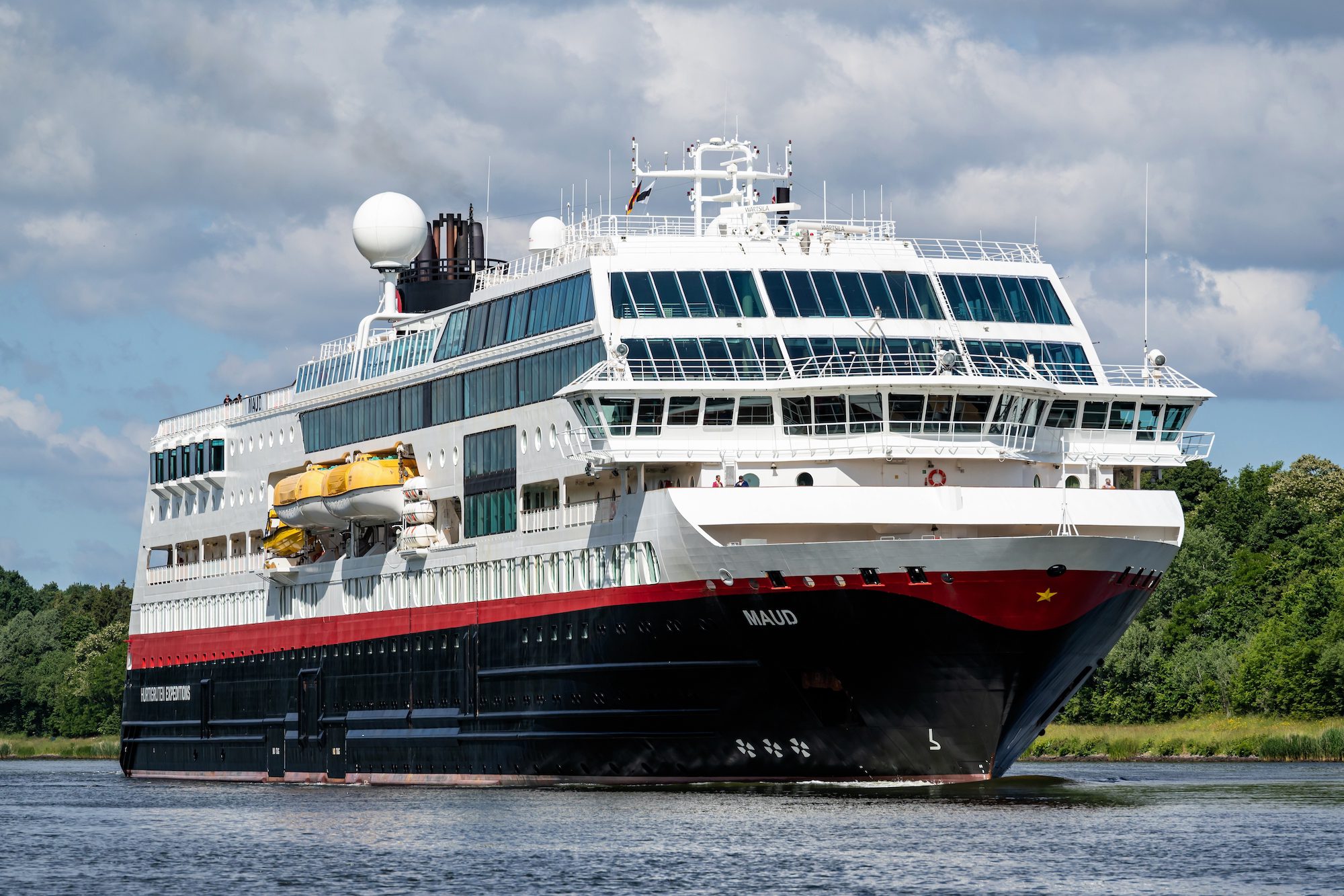 Hurtigruten Cruise Ship Awaits Tow After being Hit by a Rogue Wave